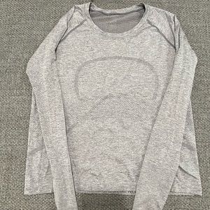 Authentic Lululemon long sleeve sweat wicking  shirt. Good condition.